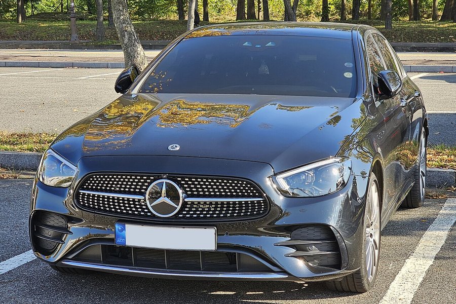 Black Mercedes-Benz E-Class executive saloon